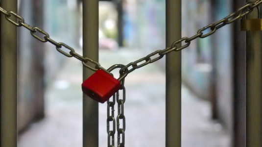 Photo of padlocked gates at the Left Bank entrance to the Left Bank Gallery.