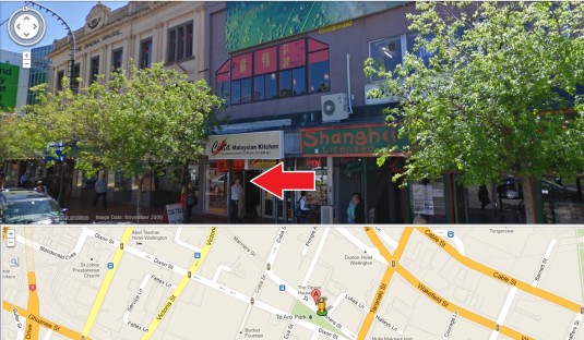 The arrow points to the stairwell, not that man who happened to pass the Google car. Click for the map.