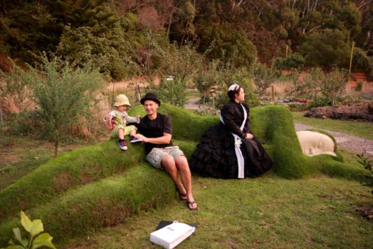 Queen Victoria and friends rest on Grant Lyon's living sculpture "Yeah, Nah".