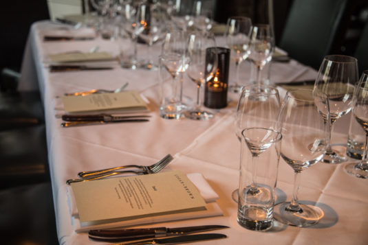 a table awaits its diners