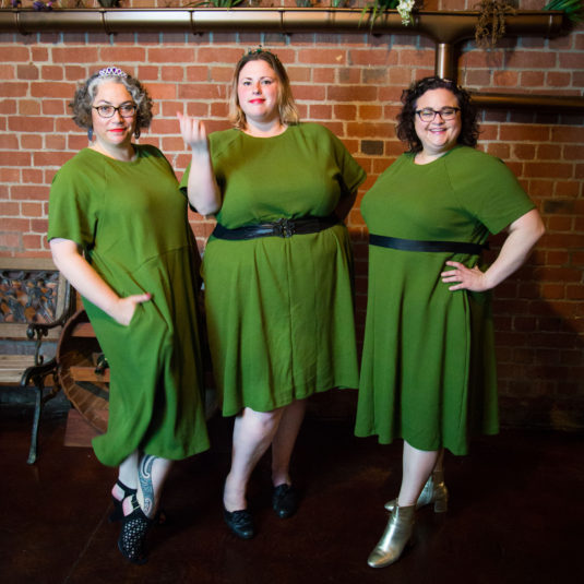 three fat babes in green dresses