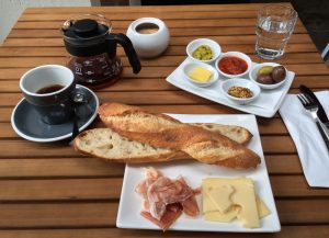 Lunch at Leeds Street Bakery, in happier times. Coffee, a small baguette, ham and cheese.