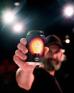 Pete Gilespie - Co-Founder of Garage Project - with a can of the new Ghost Light beer