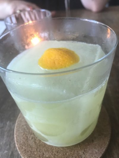 a green tinged cocktail