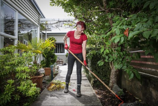Zoe at work in a garden